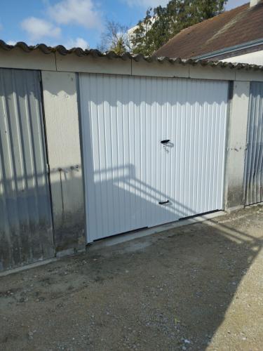 Pose d'une nouvelle porte de garage